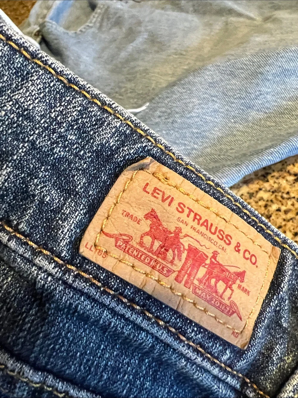 Levi's light blue denim shorts with frayed hem